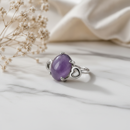 Silver-plated amethyst heart detail ring on white marble with baby's breath flowers and silk, size 19, Arnia CraftyGirl