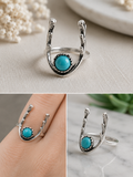 Branch/antler detailed ring with single round turquoise stone size 17