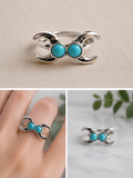 Silverplated ring with 2 turqoise roun stones and crescent moon detail size 17